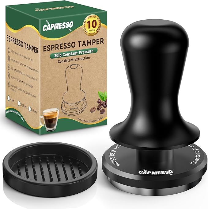 The 51mm Espresso Tamper by CAPMESSO, equipped with a calibrated 3-spring mechanism and stainless steel ripple base for precision, is showcased alongside its branded box. The package highlights consistent extraction and comes with a matching tamping mat, all backed by a reassuring 10-year guarantee.